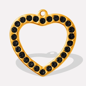 Macro shot of gold heart pendant with black rhinestones and stainless steel hanging ring