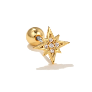 Detail view of a gold eight-pointed star ear stud with white zircons and ball screw back