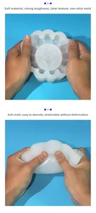 Flexible white silicone mold for skull cross ashtrays showing its durable tensile strength