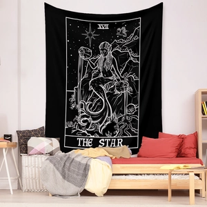 Detail of The Star Tarot tapestry hanging over a bed in a cozy bedroom setting