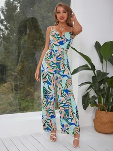 Close-up of tropical leaf print and high-waist design on summer cami jumpsuit