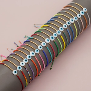 Bracciale fatto a mano in perline Miyuki con malocchio su corde colorate regolabili