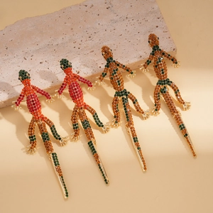 Golden lizard hair clips with sparkling colorful rhinestones in a luxury nature design