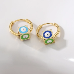 18K gold-plated huggie hoop earrings with blue and green enamel evil eye cube charms