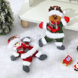 Christmas plush snowmen and reindeer ornaments on white fur with festive tree decor