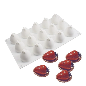 Detail view of a 15-cavity white silicone strawberry mold with finished red mousse desserts