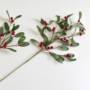 Artificial Christmas pick with red berries and green pine needles for holiday home decor
