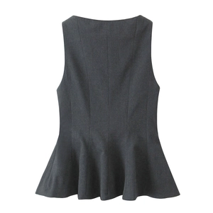 Detail of dark grey sleeveless top showing fine twill fabric texture and back ruffles