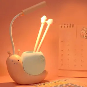 Pink snail-shaped LED desk lamp with built-in pencil holder for children's study desk