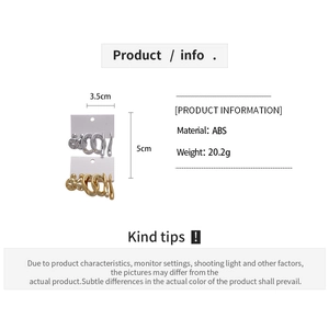 Detail of 6-piece geometric twisted round stud earrings in gold and silver finish