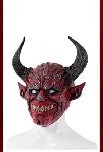 Detailed texture of red devil latex mask with curved black horns and sharp fangs