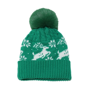 Christmas knit hat with pompom featuring white reindeer and snowflake patterns