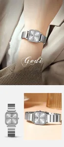 Detailed view of women's square silver stainless steel watch with sunray dial