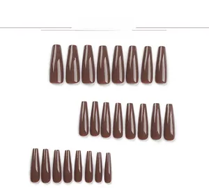 Detailed view of 24 pieces dark brown long coffin shaped glossy ballerina press-on nails