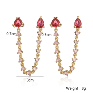 Gold plated tassel earrings with red heart gems and dangling chains, 8cm length