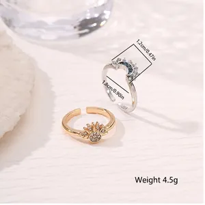 Minimalist sun and moon open rings set with blue and white zircons in 1.8cm diameter