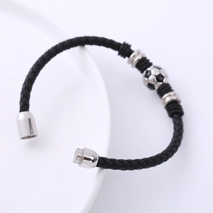 Classic braided leather football bracelet with magnetic clasp and steel soccer charm