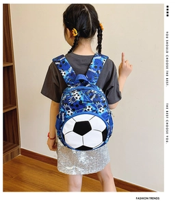 Kid back view wearing blue camouflage football backpack with 3D soccer ball pocket