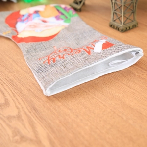 Linen Christmas stocking with Santa applique and Merry Christmas embroidery detail
