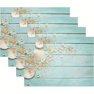 Detailed view of 4 blue ocean placemats with shell patterns and wood grain texture