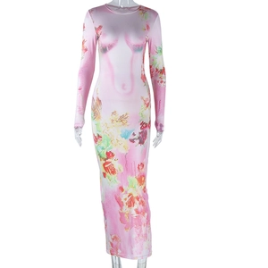 Detail of slim fit long sleeve maxi dress with body contour and floral print
