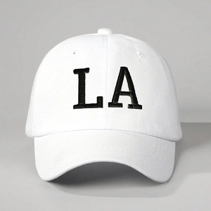 White baseball cap with black LA embroidery and classic curved brim for men and women