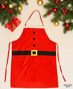 Detail of red Santa apron with black belt print and white lace trim on festive background