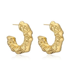 Elegant 18K gold plated heart earrings with unique hammered lava texture on white background