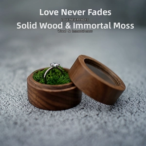 Walnut wood ring box with green preserved moss and transparent lid for wedding rings