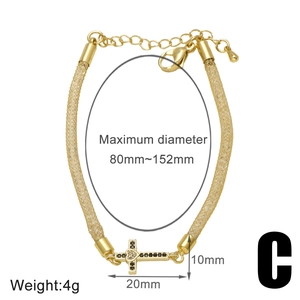 Detail of 18k gold plated cross bracelet with cubic zirconia and lobster clasp
