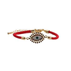 Bracciale regolabile in cordino rosso con ciondolo malocchio dorato e zirconi colorati