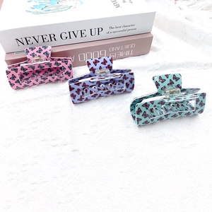 Pinces à cheveux vintage françaises à motif papillon en rose, violet et bleu cyan