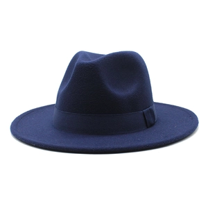 Detailed view of navy blue wool fedora hat with matching decorative satin ribbon