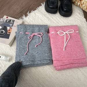 Soft ribbed knit scarf set in grey and pink with delicate bow tie design detail