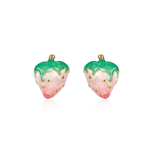 Pink strawberry enamel earrings in gold plating with reflective surface on white background