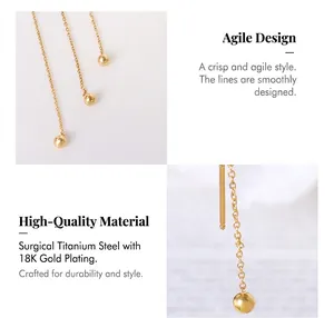 Detailed close-up of 18K gold plated titanium steel earring chain and round bead