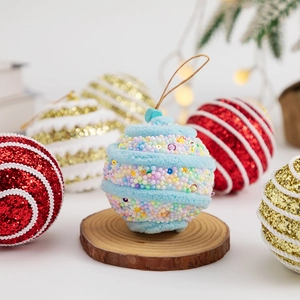 6cm Christmas tree balls with glitter and foam textures in a warm festive holiday setting
