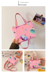 Pink canvas crossbody bag featuring cartoon pumpkin and ghost Halloween patterns