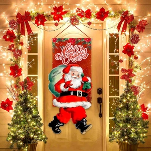 Christmas Santa Claus door banner hanging on a wooden door with festive lights decoration