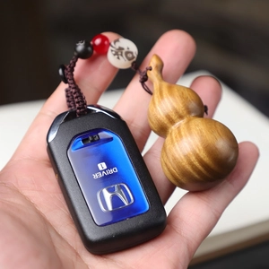 Handcrafted rosewood gourd keychain pendant with braided rope and decorative beads