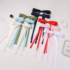 Elegant long satin ribbon bow hair clips set in eight assorted solid colors for girls
