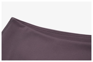 Détail de taille en tricot haute densité avec coutures plates renforcées sur legging sport