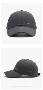 Détail du tissu en maille respirante gris foncé sur une casquette de baseball de sport légère