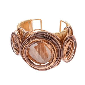 Handcrafted woven wire cuff bracelet with a large faceted brown gemstone in retro style
