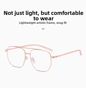 Detail of rose gold double bridge metal frame glasses with a hexagonal oversized lens design
