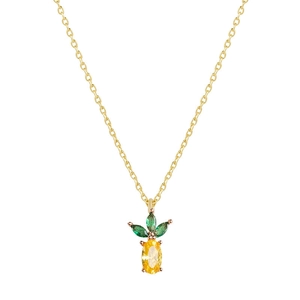 Detailed view of a gold pineapple pendant necklace with sparkling yellow and green crystals