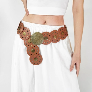 Vintage brown PU leather waist belt with bohemian brass discs worn over a white dress