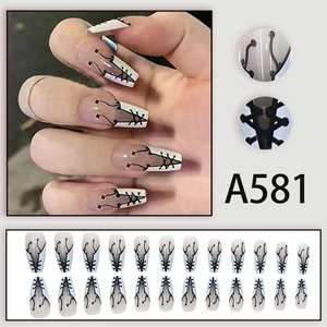 Detail view of long coffin press-on nails featuring a corset lace-up design with 24 pieces