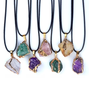 Set of raw crystal necklaces including amethyst rose quartz and citrine with gold plating