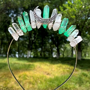 Detail of green and white crystals with silver moon on handmade boho headband